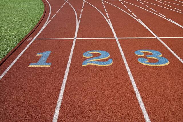 logo image showing a track with lanes